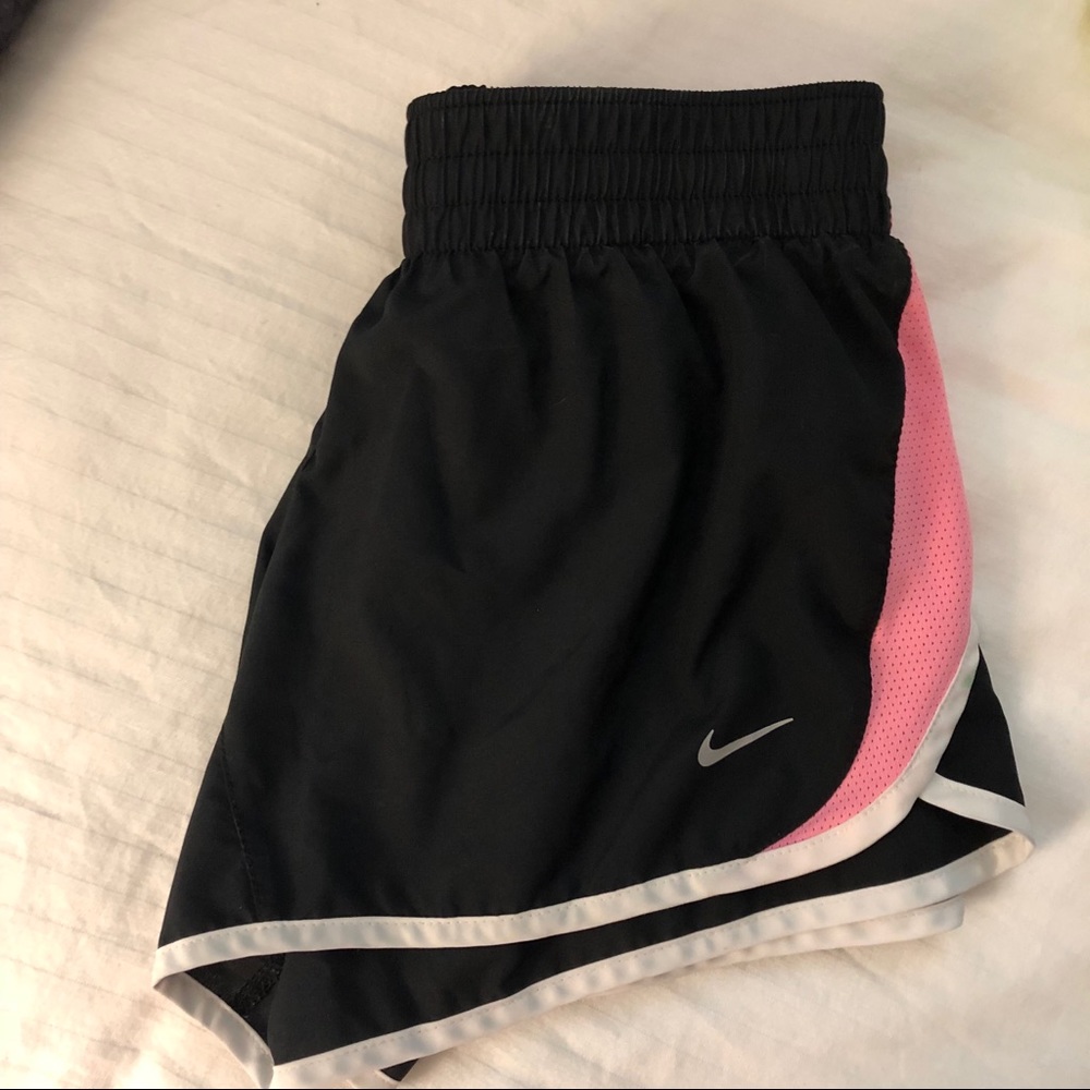 Black and pink Nike running shorts